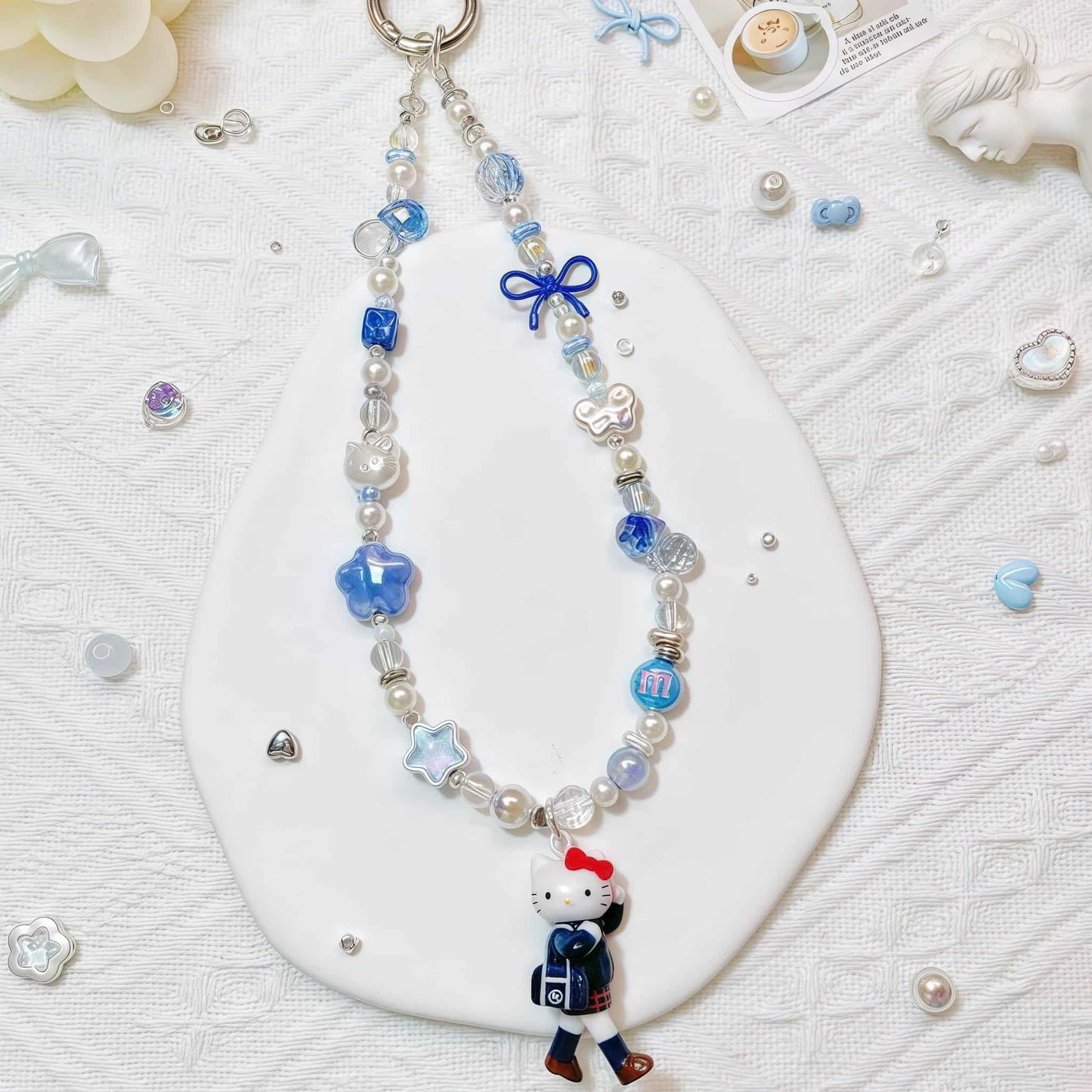 Handmade Hello Kitty phone chain with durable cord and kawaii pendant charm