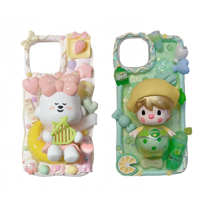 Close-up of handmade decoden phone case showing intricate cream glue design with kawaii elements and shockproof protective features