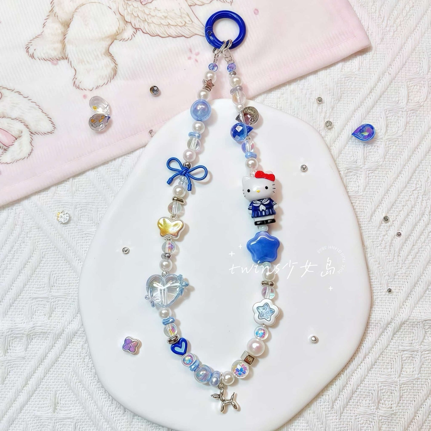 Blue Hello Kitty handmade keychain with baroque pearl charm