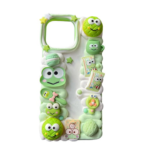 Handmade decoden phone case featuring Sanrio Keroppi character with cream glue baroque design, adorned with pearls and rhinestones