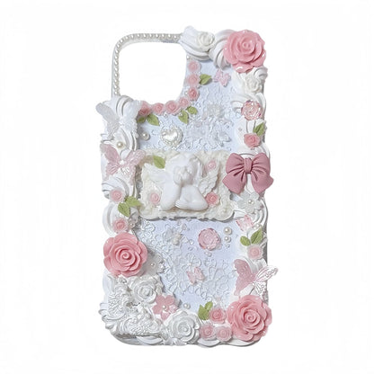 decorative decoden phone cases with angel accents, bows & pearls, romantic aesthetic.