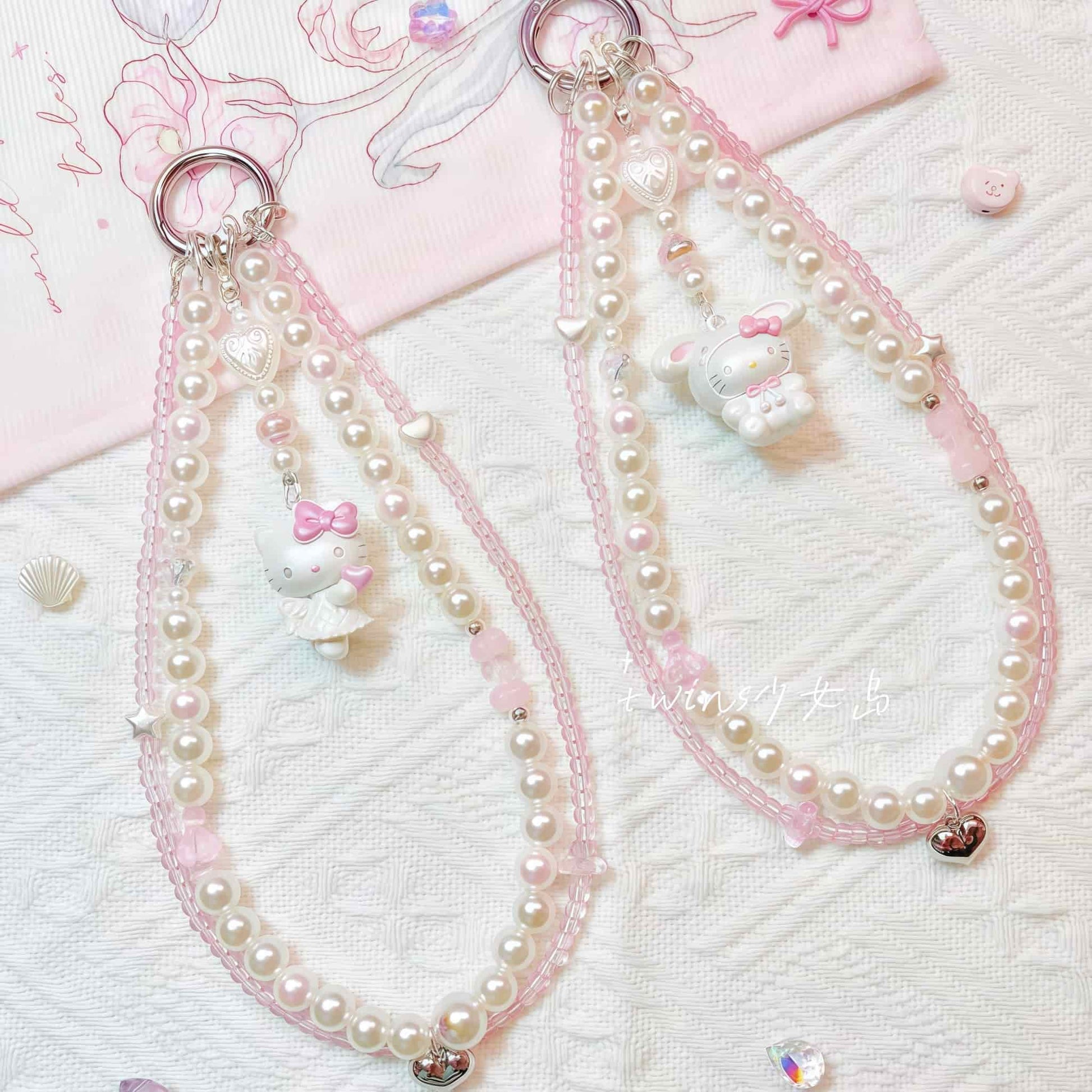 Handmade baroque pearl phone chain with Sanrio character charm - premium kawaii accessory