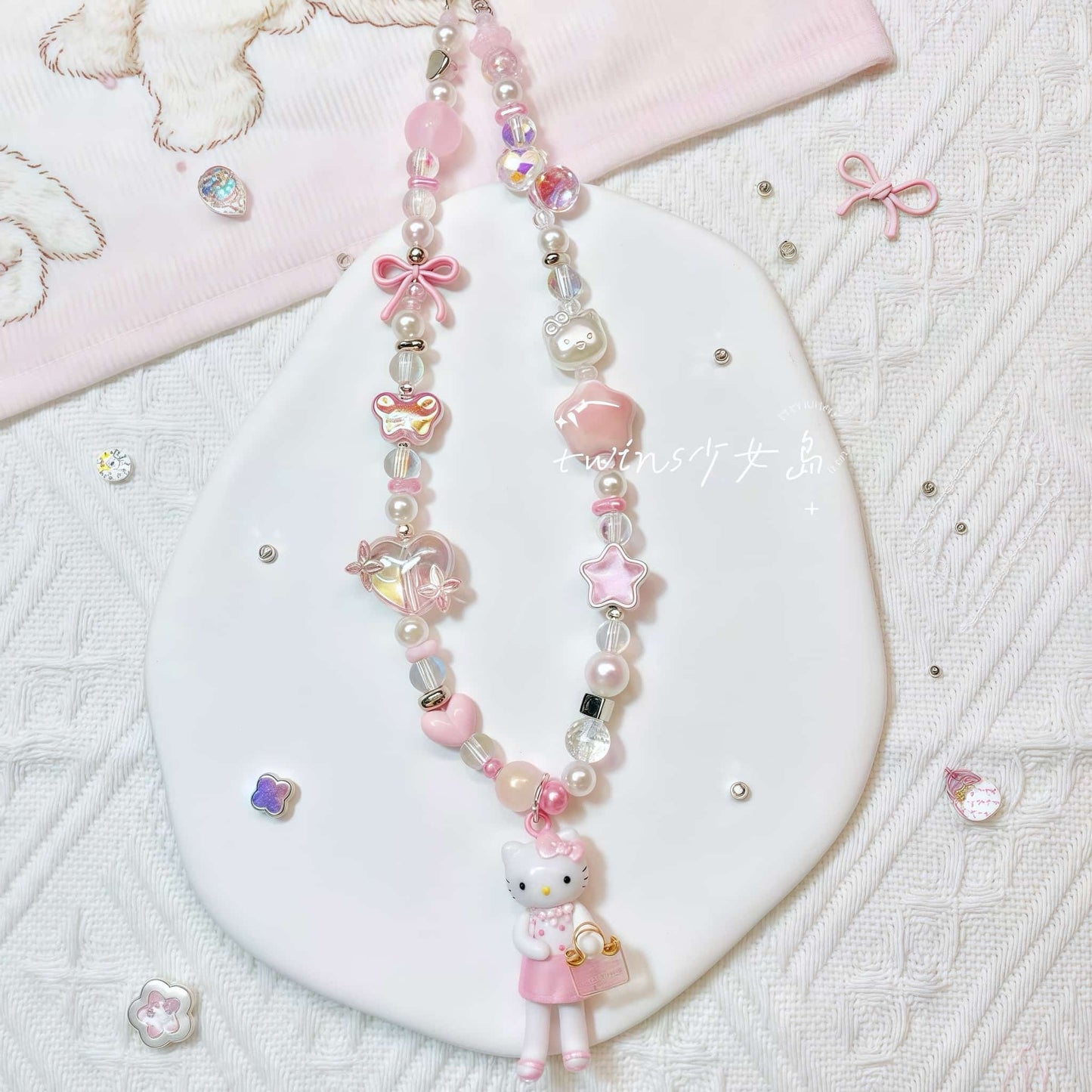 Baroque Hello Kitty phone lanyard with pearl embellishments and handcrafted charm strap