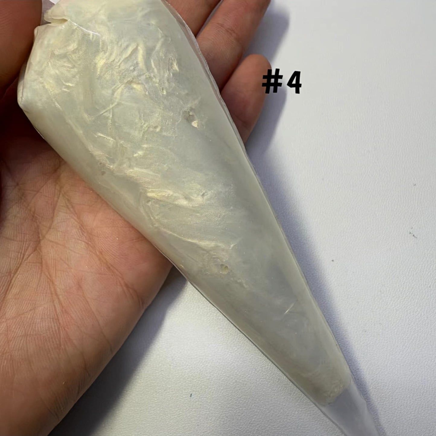 Beige pearlized cream glue with shimmer effect for phone case customization and kawaii accessories