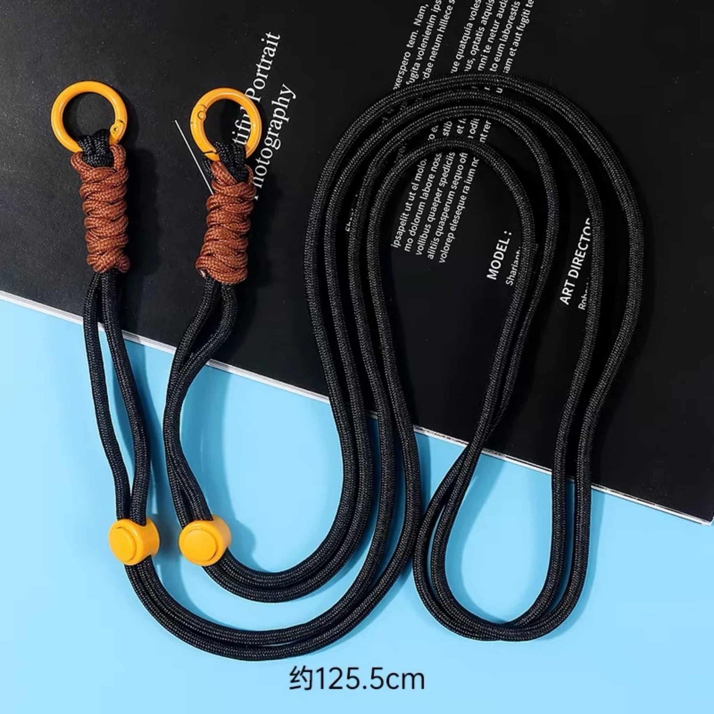 Black crossbody phone chain with durable cord construction