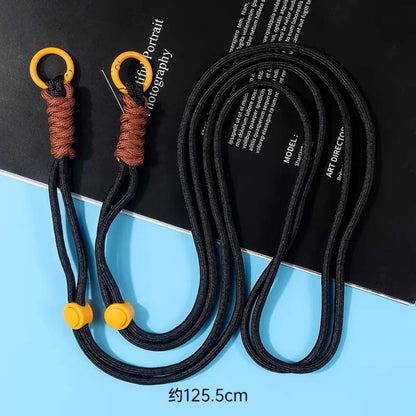 Black crossbody phone chain with durable cord construction