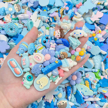 Colorful kawaii resin charms collection featuring cartoon characters and decorative pieces for DIY decoden projects