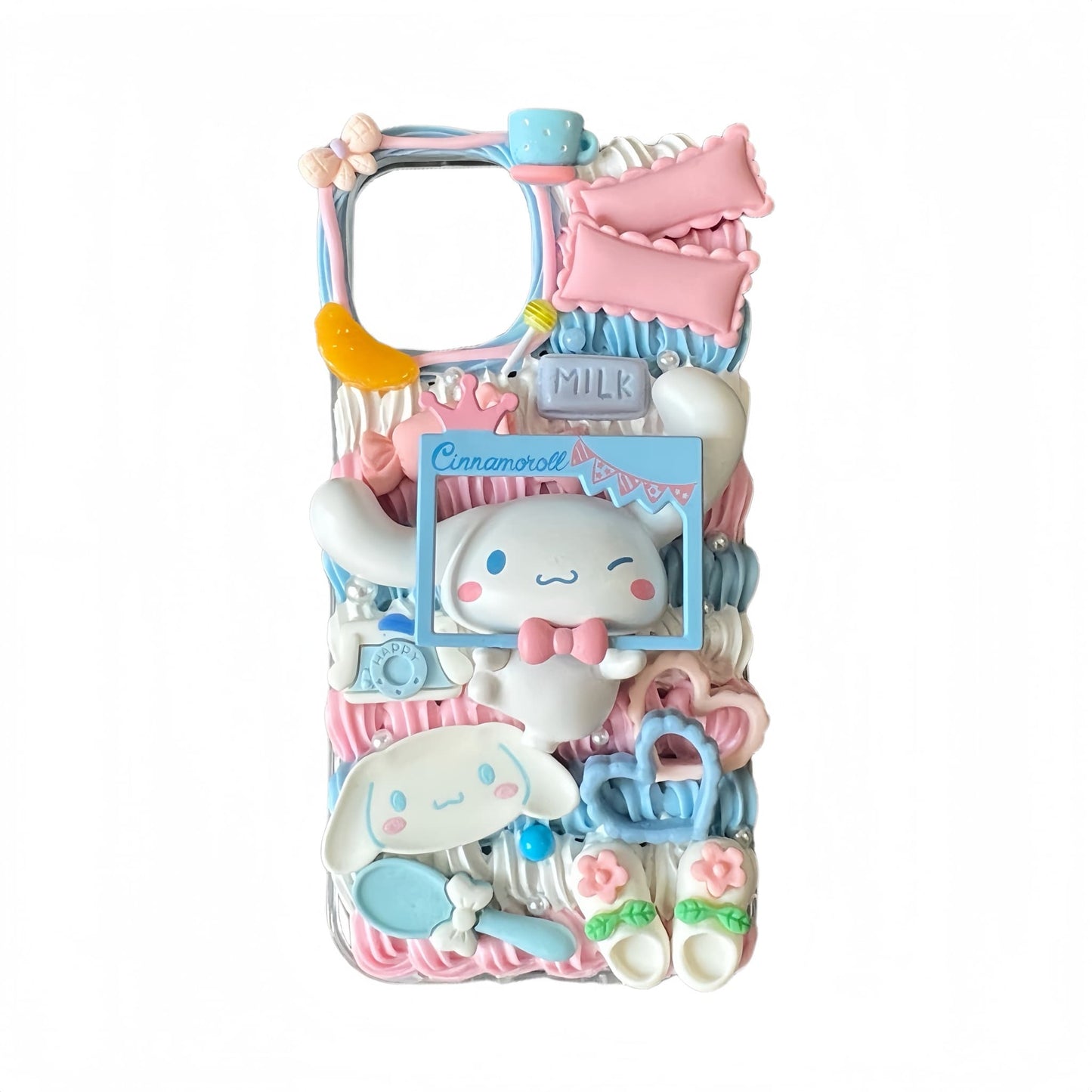 Y2K kawaii Cinnamoroll decoden phone case showing handmade cream glue embellishments and Sanrio charms