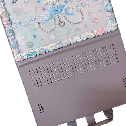 klawaii decoden laptop case being carried by handle