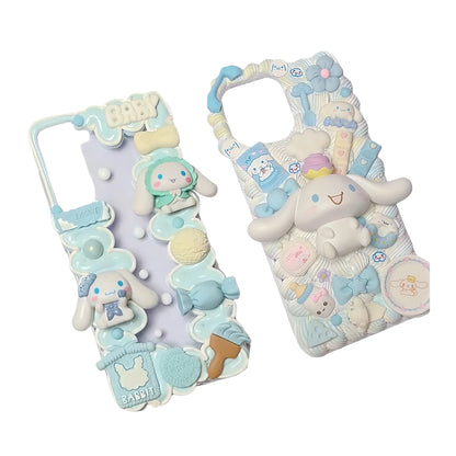 kawaii Cinnamoroll decoden phone case showing handmade cream glue embellishments and Sanrio charms