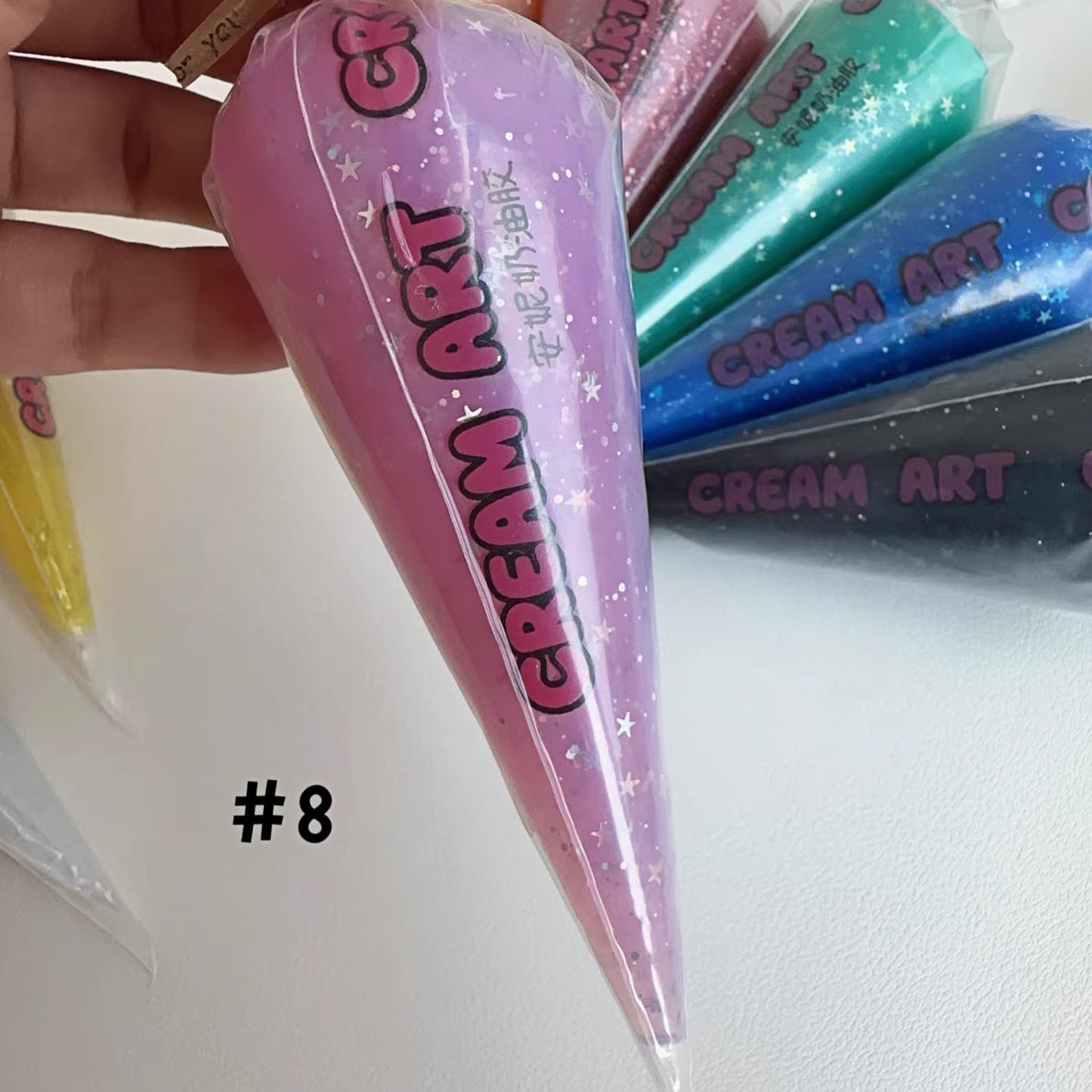 Pink star glitter cream glue perfect for kawaii and Y2K aesthetics