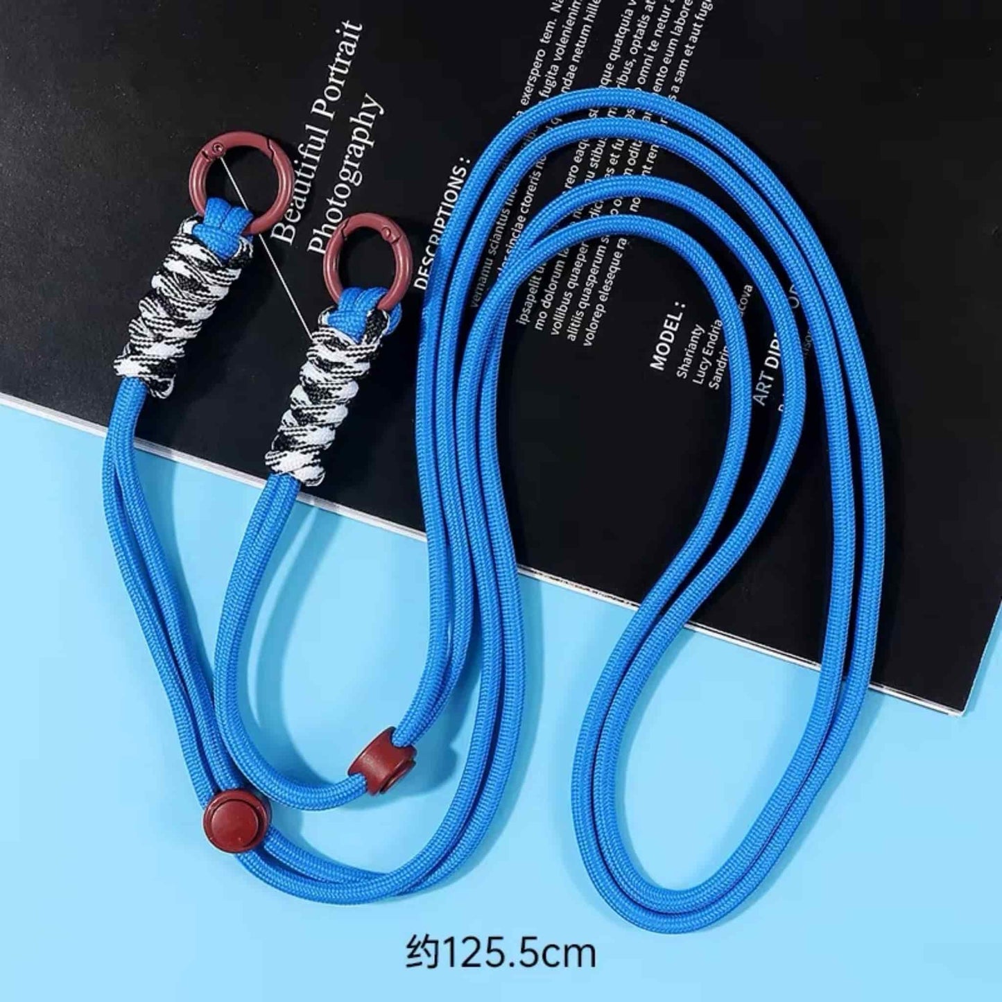 Crossbody phone chain detail showing clasp and bead quality