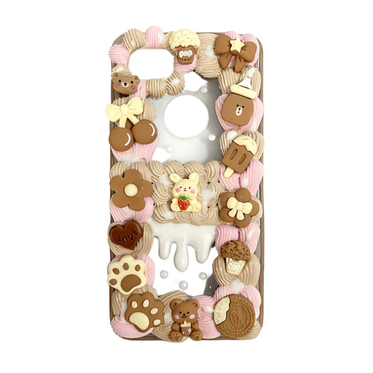Handmade decoden phone case featuring kawaii bear character with cream glue design, baroque-inspired embellishments, and Y2K aesthetic in brown tones