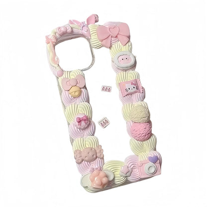 Custom kawaii decoden phone case with Hello Kitty theme and handmade cream glue embellishments