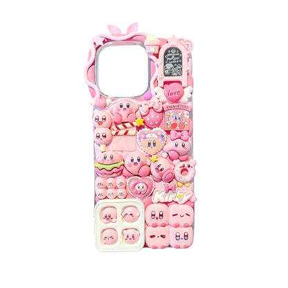 Close-up of custom Kirby decoden phone case showcasing intricate handcrafted cream glue details and Y2K inspired embellishments