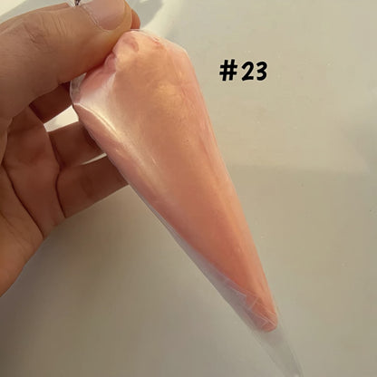 Easy-to-use cream glue with precision tips for intricate designs