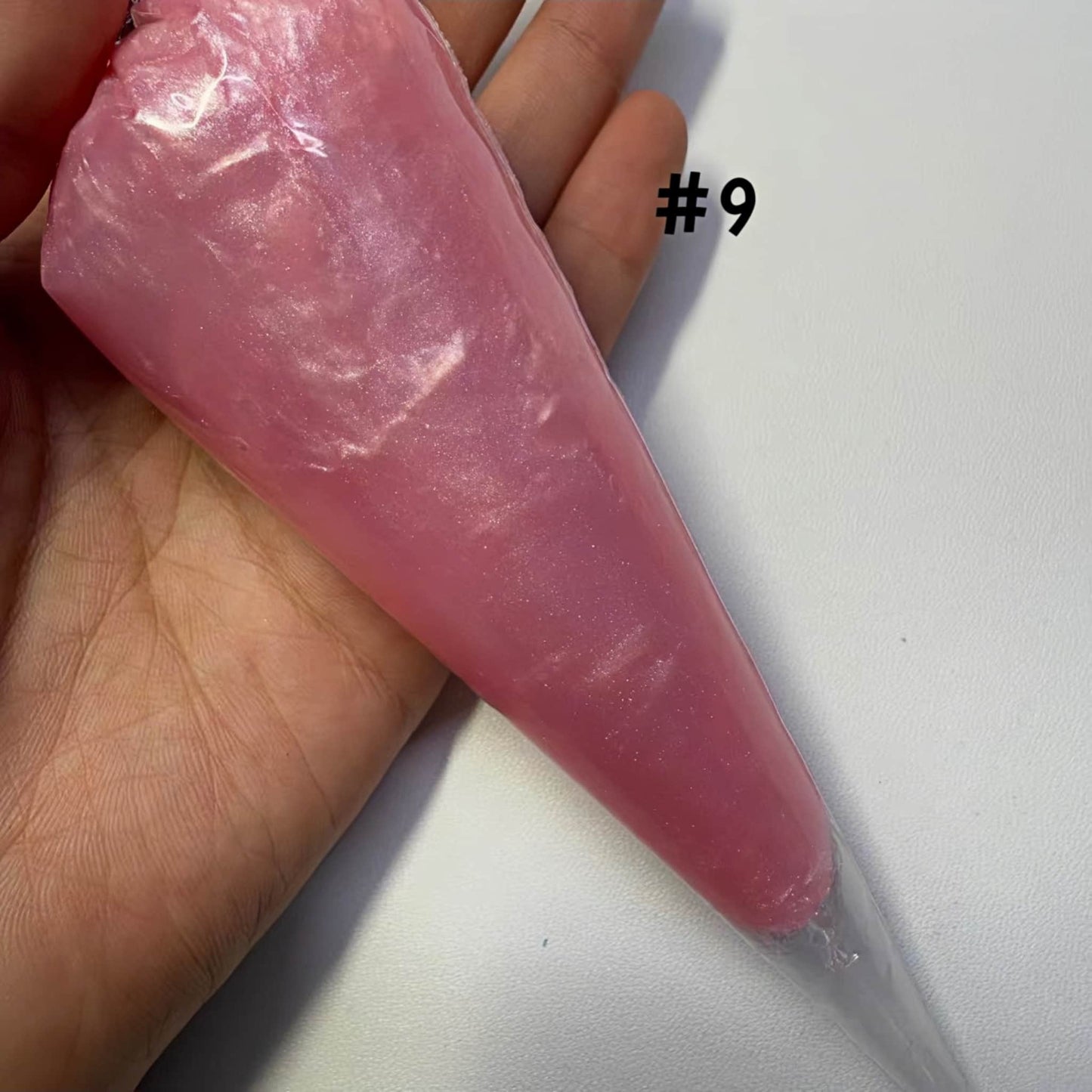 Pearlescent cream glue in pink shade with piping tip for 3D decoden craft projects
