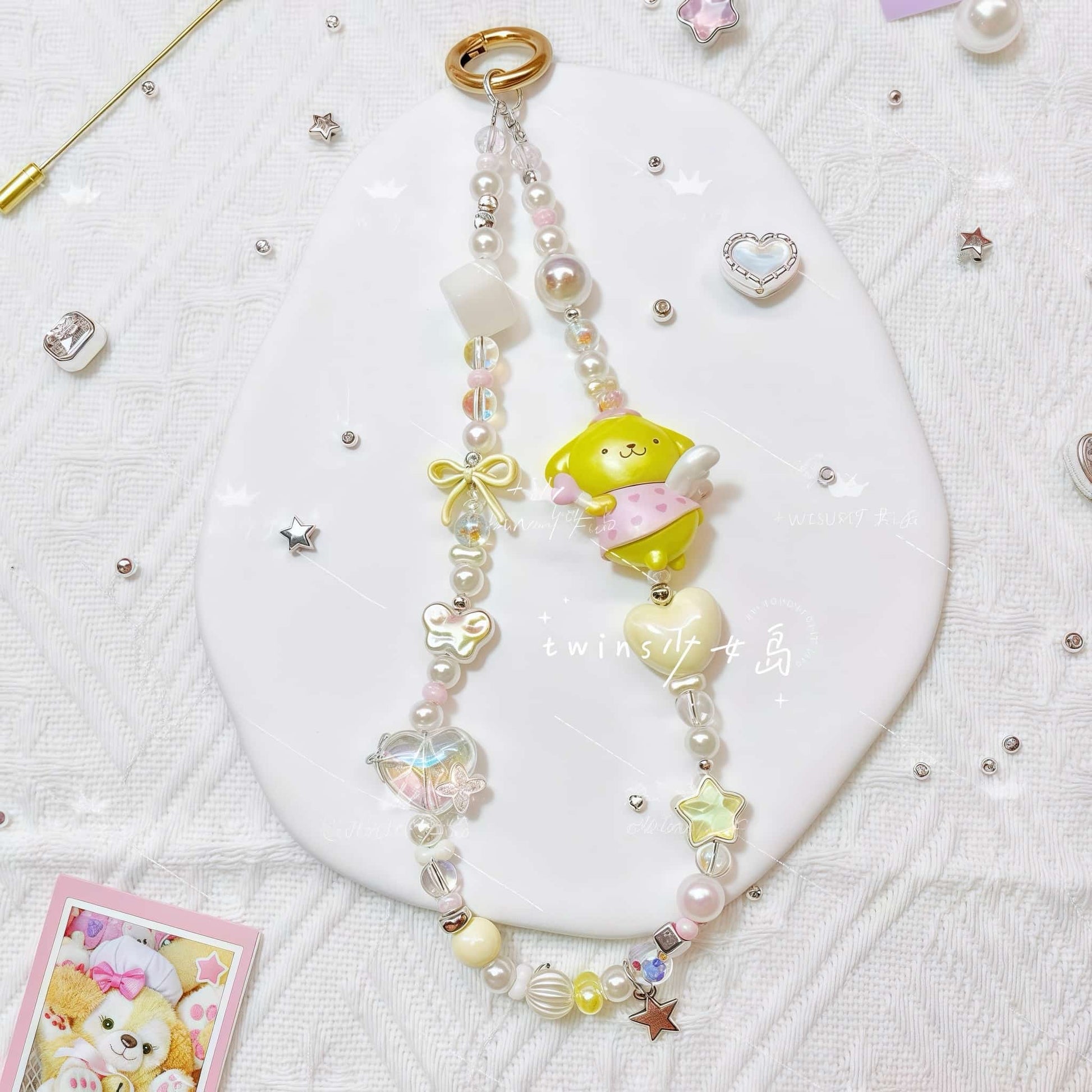 Handmade Pom Pom Purin keychain with baroque pearl charm strap
