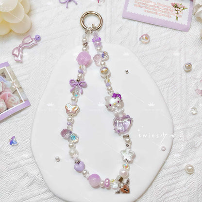 Handmade Hello Kitty phone chain with crystal beads and bow charm - premium Sanrio accessory