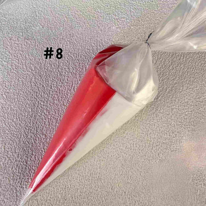 Two-tone red and white cream glue adhesive with piping tip for kawaii craft projects