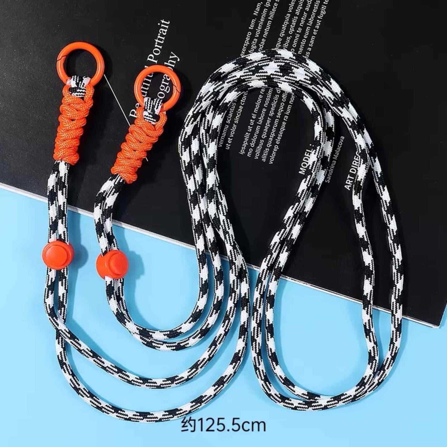 White and black crossbody phone chain with minimalist design