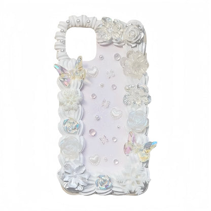Ornate phone case featuring pink pearls and gold accents