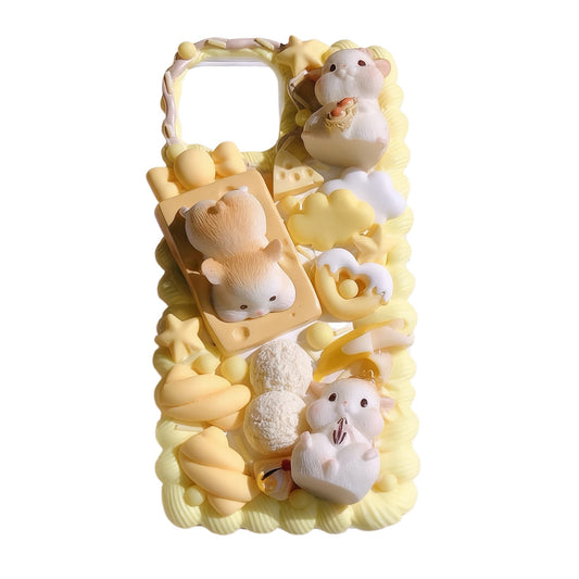 Handmade yellow decoden phone case with Cute hamster design, featuring cream glue embellishments and kawaii baroque-style decorations
